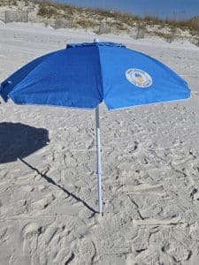 When you upload a photo of the umbrella, use: alt="Tommy Bahama 6 foot beach umbrella rental delivery Pensacola Destin 30A"