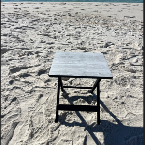 19-inch-folding-beach-side-table-rental-delivery portable beach table rental, beach equipment delivery, beach gear for Airbnb, condo beach rental, hotel beach equipment delivery, Pensacola Beach beach rentals, Gulf Breeze beach gear, Navarre Beach equipment rental, Perdido Key beach accessories, Destin beach table rental, Fort Walton Beach rentals, 30A beach gear delivery, Santa Rosa Beach rentals, Miramar Beach beach equipment, Panama City Beach rentals, sand-free beach table, lightweight folding side table, beach furniture delivery, vacation rental equipment, Beach Bum Accessories, beach gear for apartments, sturdy beach side table, modern beach accessories, Florida Panhandle beach rentals.